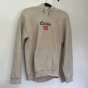 Coors banquet sweatshirt, tan with logo, size small.